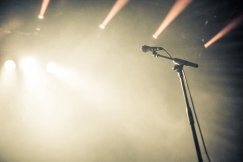 microphone-on-empty-stage-waiting-for-a-voice-PZLZXLV